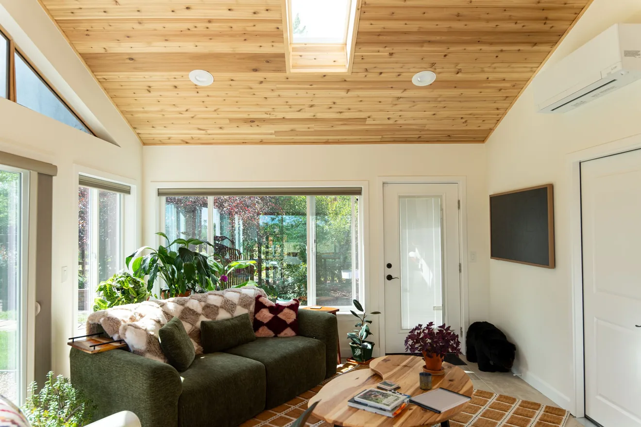 Finished sunroom and kitchen update with vaulted wood ceiling
